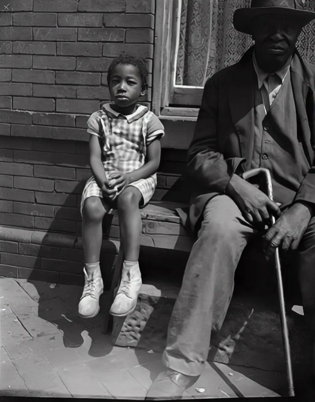 Restored family photo on the front porch, three generations together