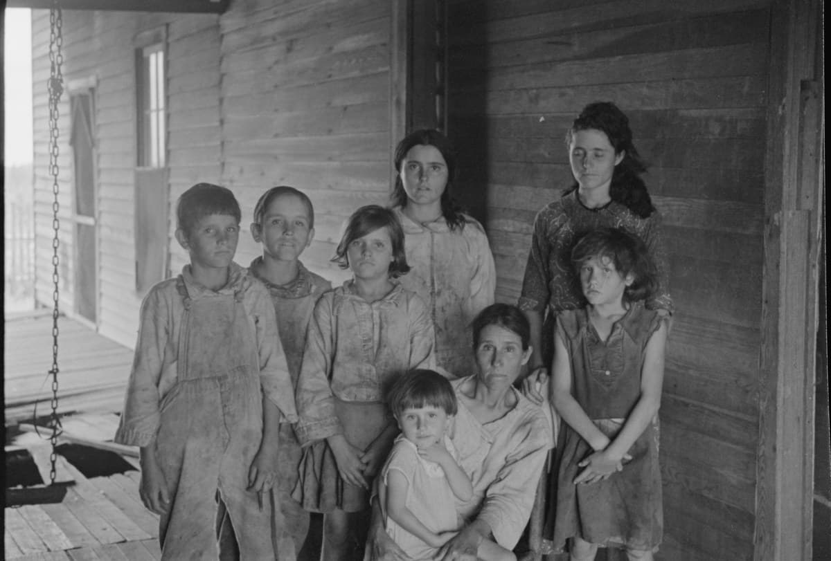 The Frank Tengle family on their porch in Hale County, Alabama, 1936. Public-domain photograph by Walker Evans.
